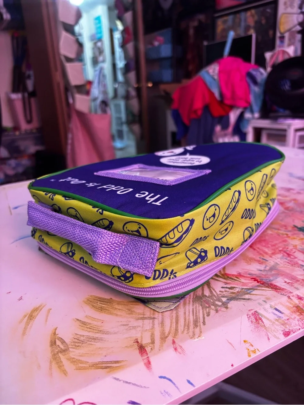 Odd1sout lunchbox with reversible front image